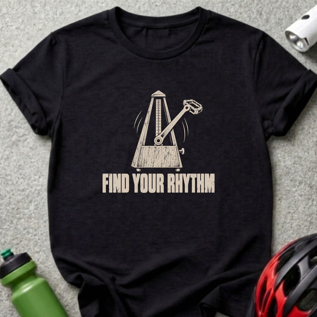 A black t-shirt printed with a metronome graphic and the text Find Your Rhythm.