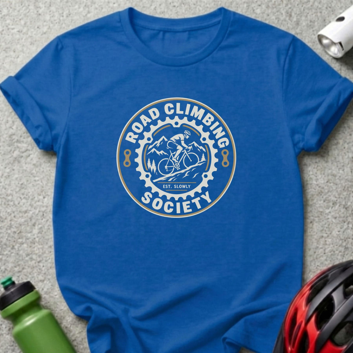 Blue t-shirt featuring a circular graphic with a cyclist and the text "Road Climbing Society".