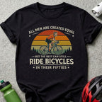 Black t-shirt with text and cyclist graphic: "All men are created equal, but the best can still ride bicycles in their fifties."