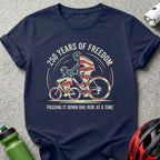 T-shirt with "250 Years of Freedom" and two cyclists, the American flag is incorporated.