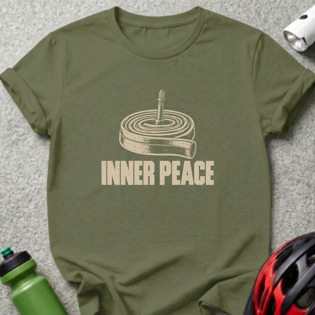 Olive green t-shirt with a graphic of a rolled bicycle inner tube and the text INNER PEACE.