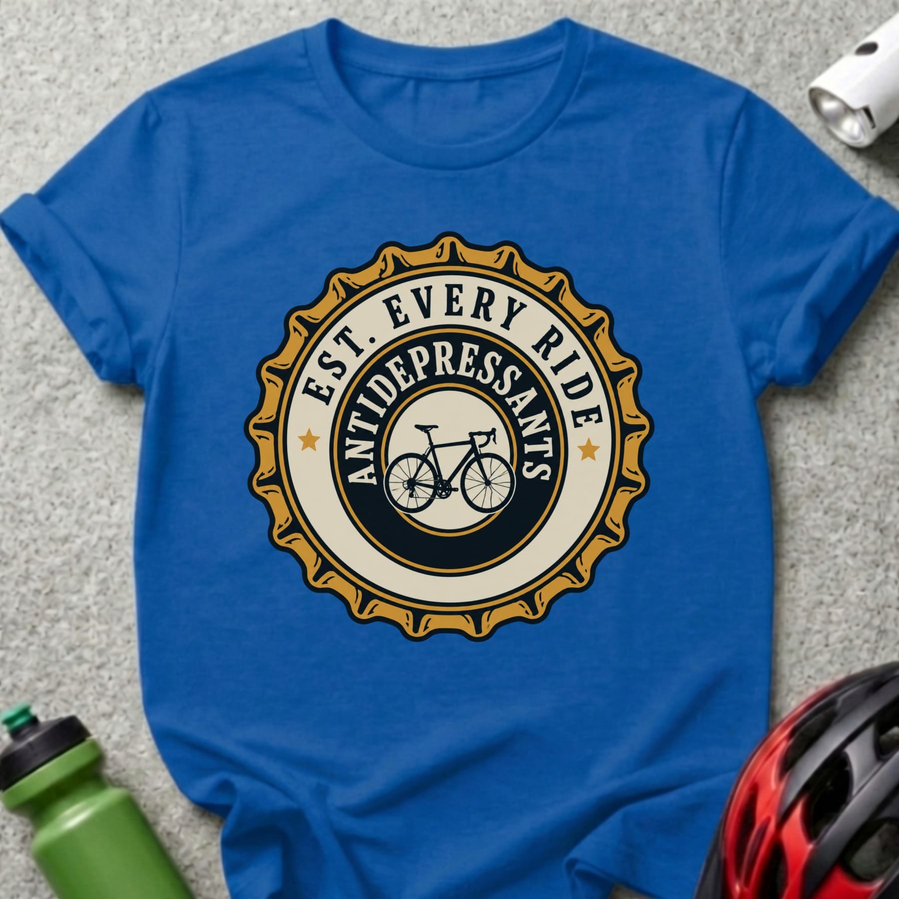 Blue t-shirt with circular "Est. Every Ride Antidepressants" bicycle logo.