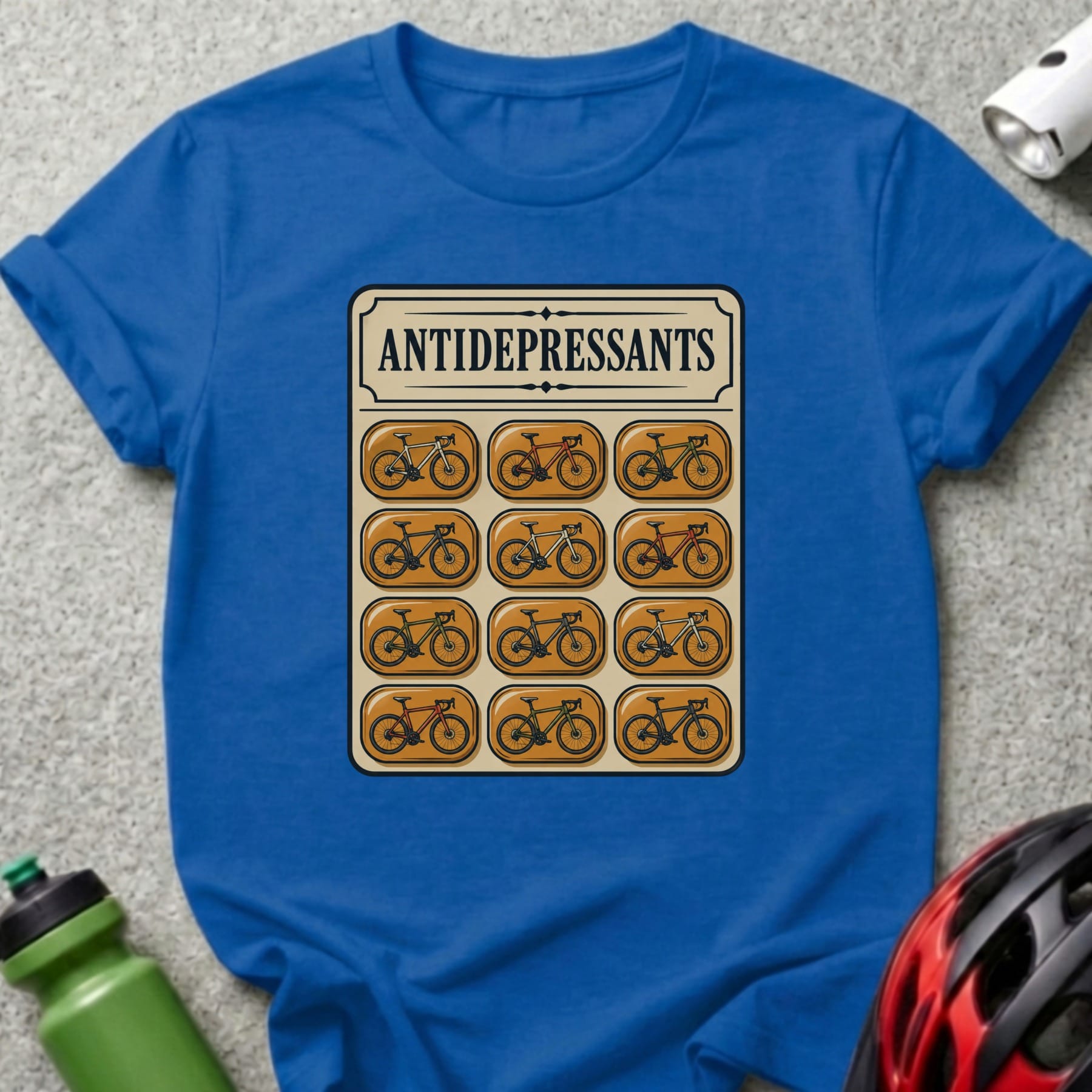 T-shirt with "ANTIDEPRESSANTS" text above a pill blister pack of bicycles.