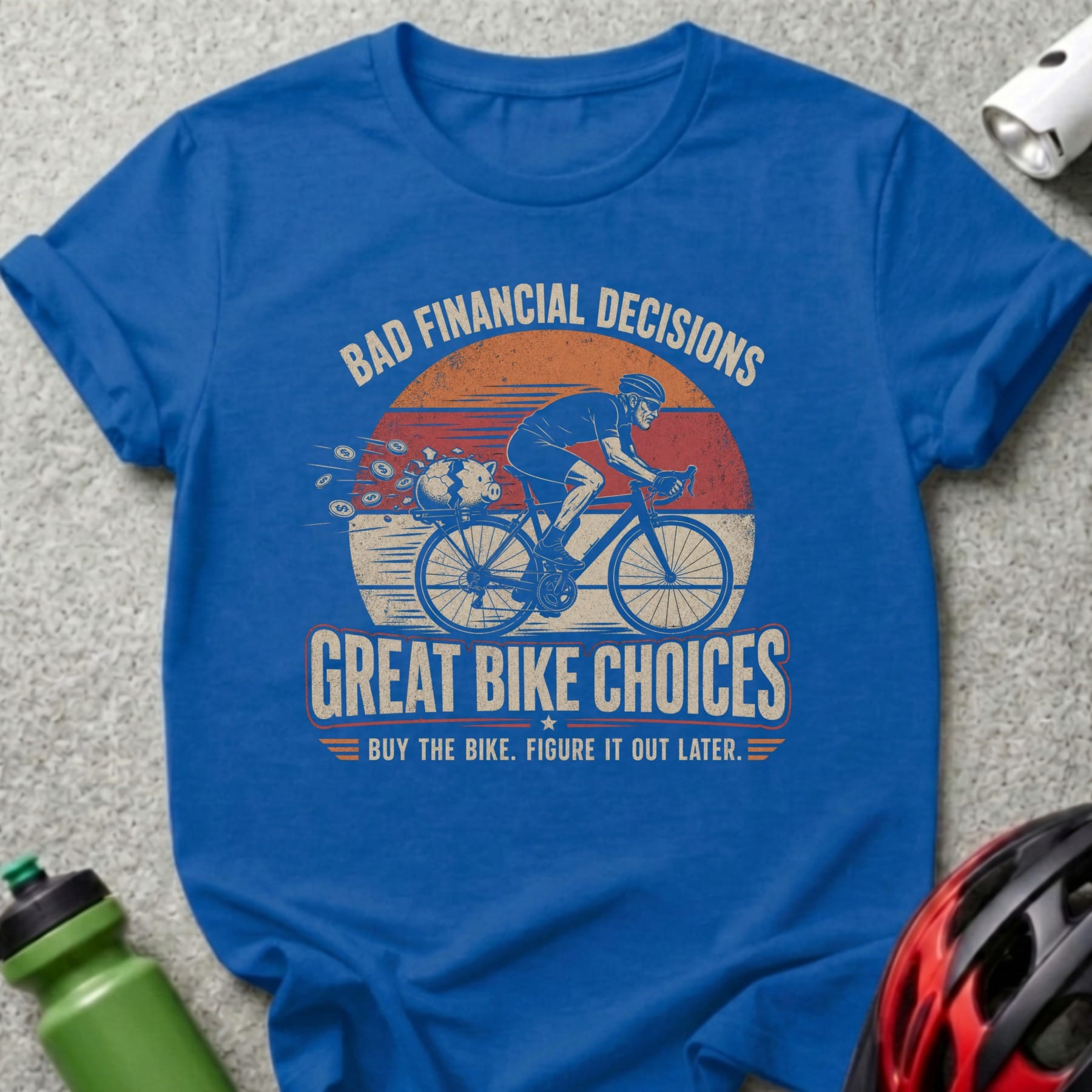 Blue t-shirt with "Bad Financial Decisions Great Bike Choices" and cycling graphic.