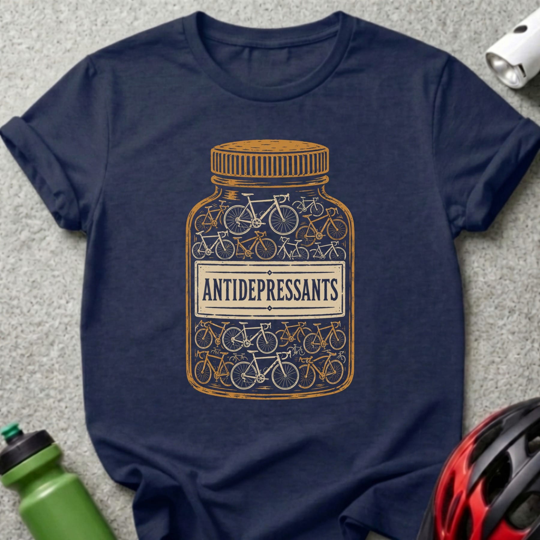 T-shirt with bottle illustration filled with bicycles and text "ANTIDEPRESSANTS".