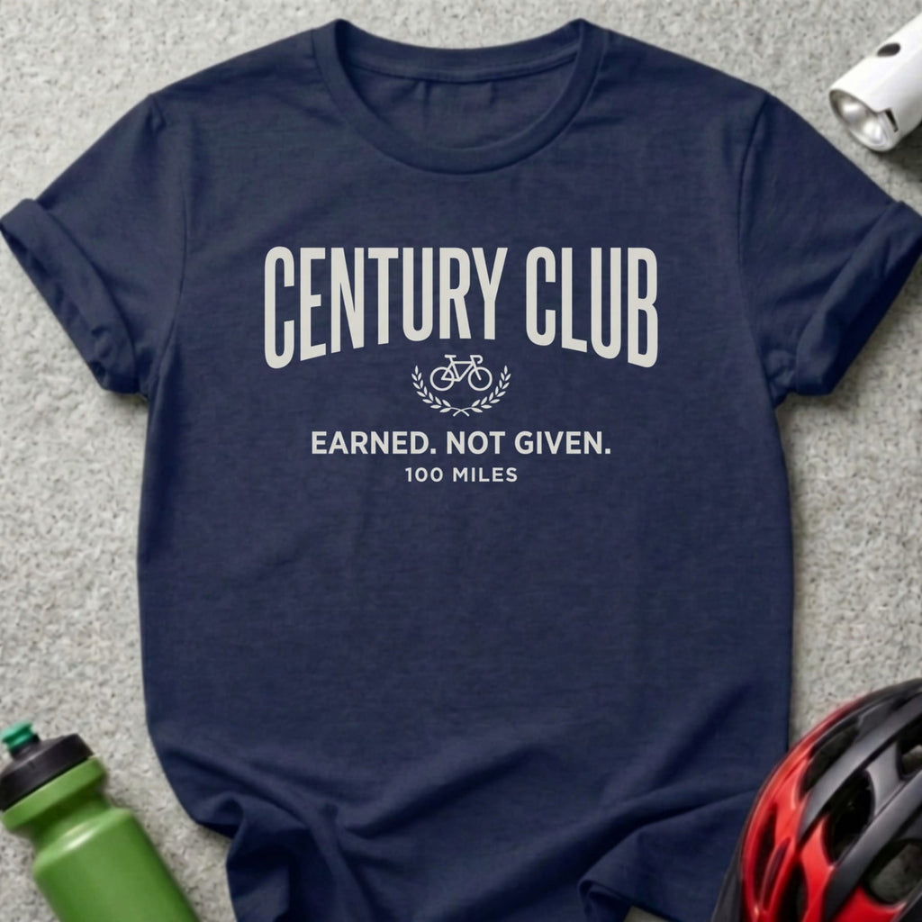 Navy t-shirt with "CENTURY CLUB EARNED. NOT GIVEN. 100 MILES" and a bicycle graphic.
