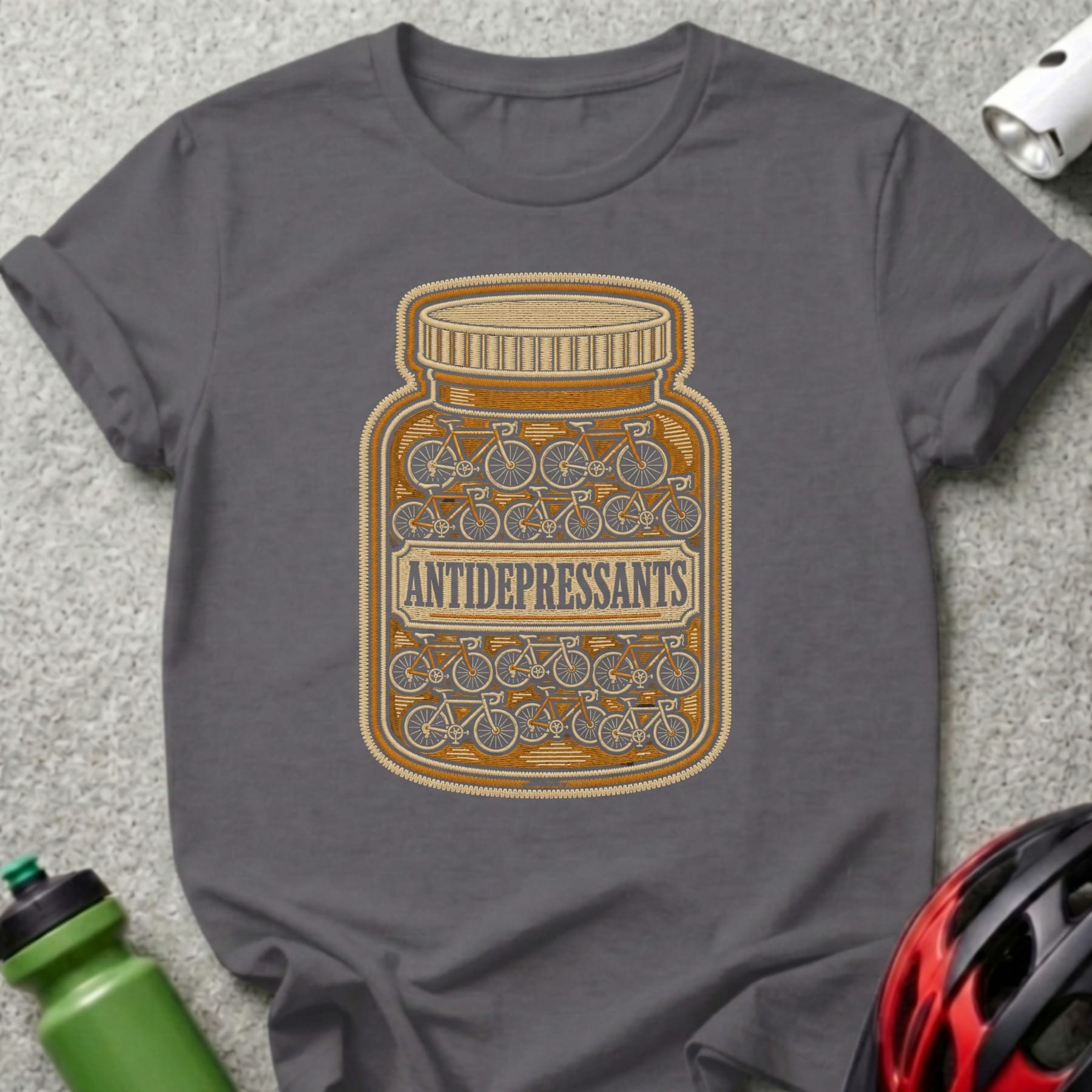 T-shirt graphic: bottle filled with bicycles, labeled "ANTIDEPRESSANTS".
