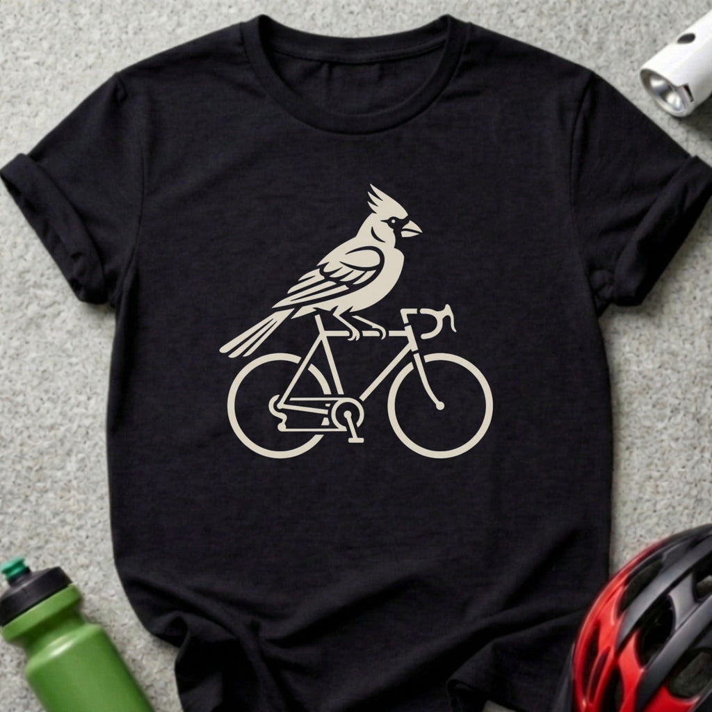 Cardinal perched on a bicycle silhouette graphic on a black t-shirt.
