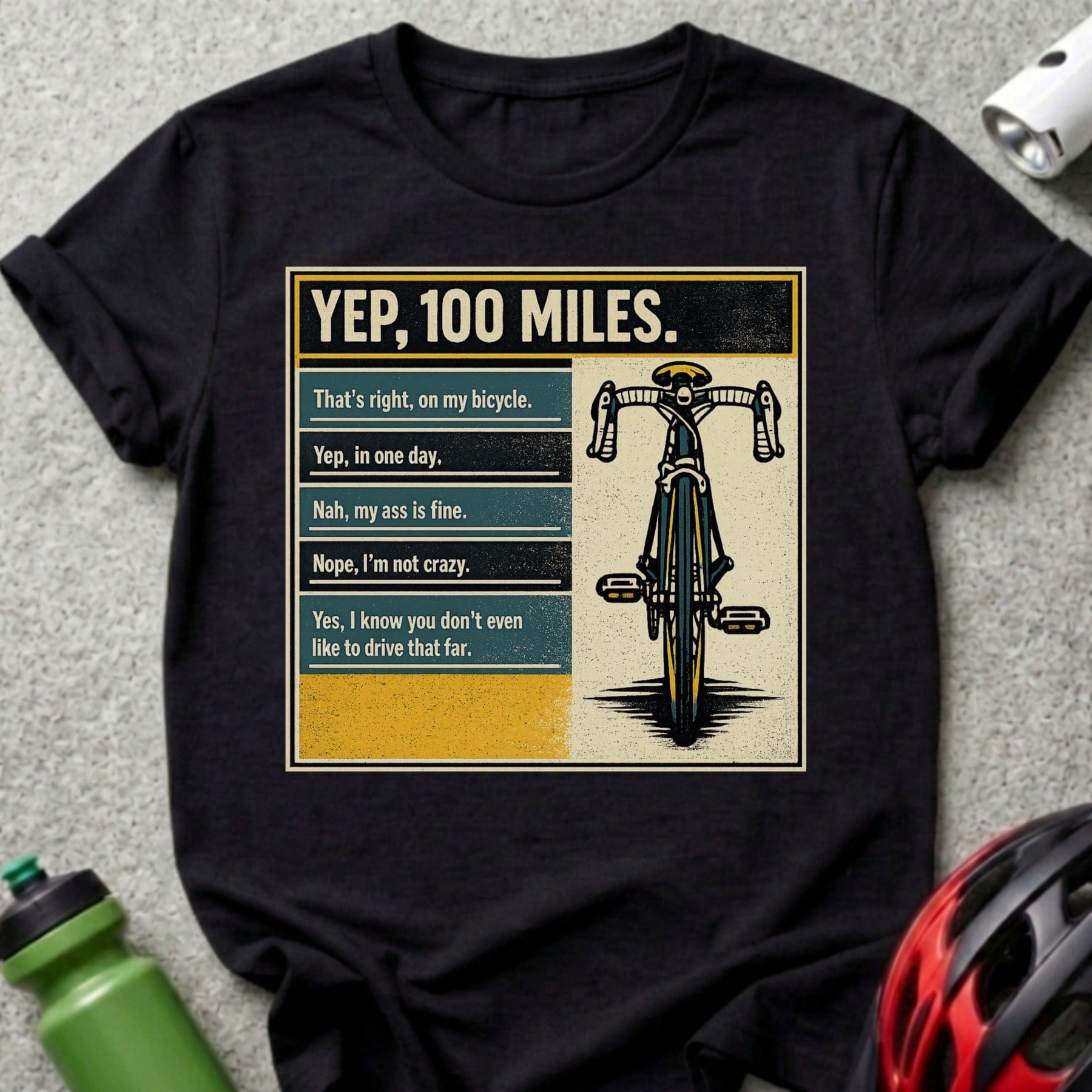 T-shirt with bicycle graphic and text about riding 100 miles.
