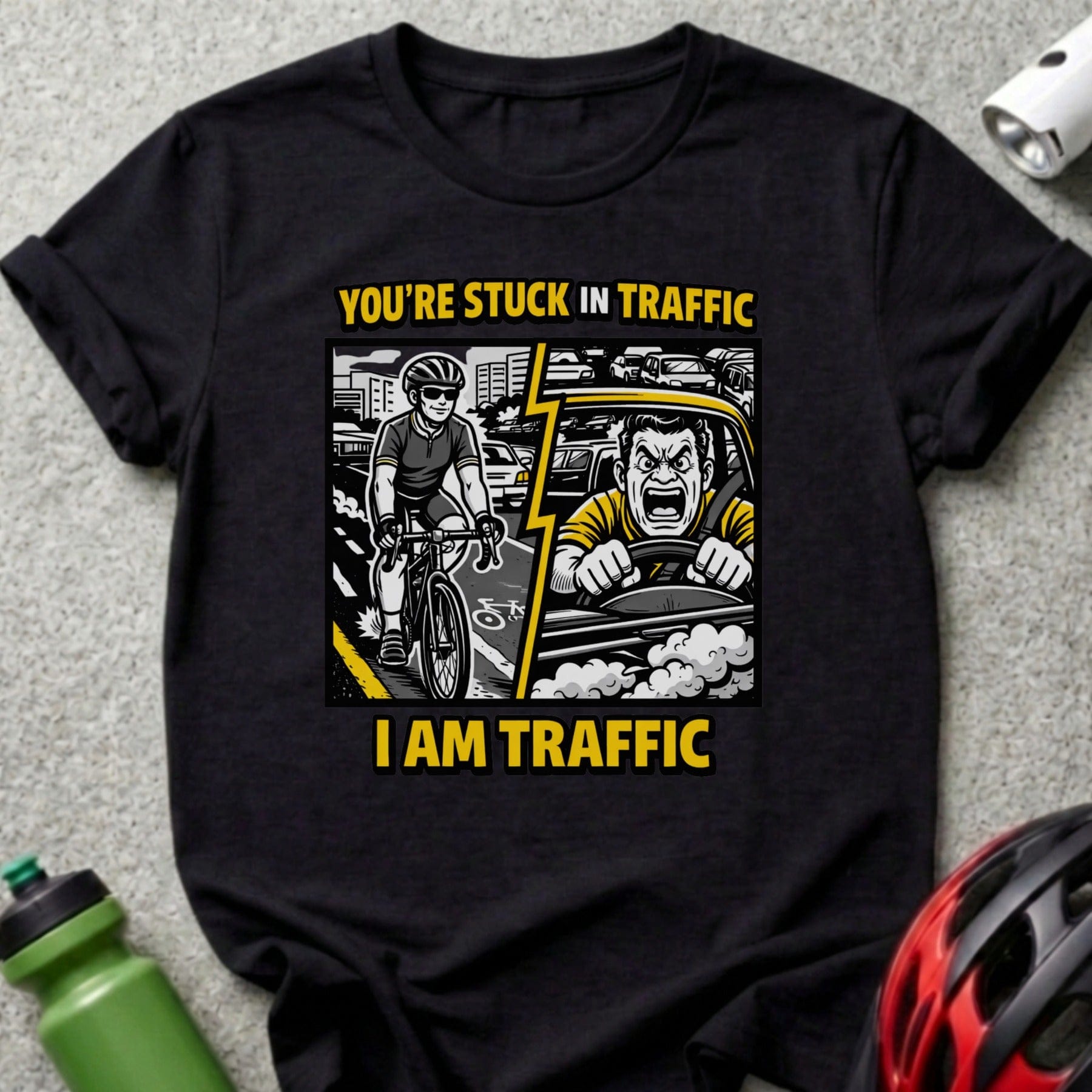 Black t-shirt with comic art of cyclist and angry driver: "You're stuck in traffic, I am traffic".
