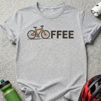 Gray t-shirt with orange bicycle graphic and "OFFEE" text.