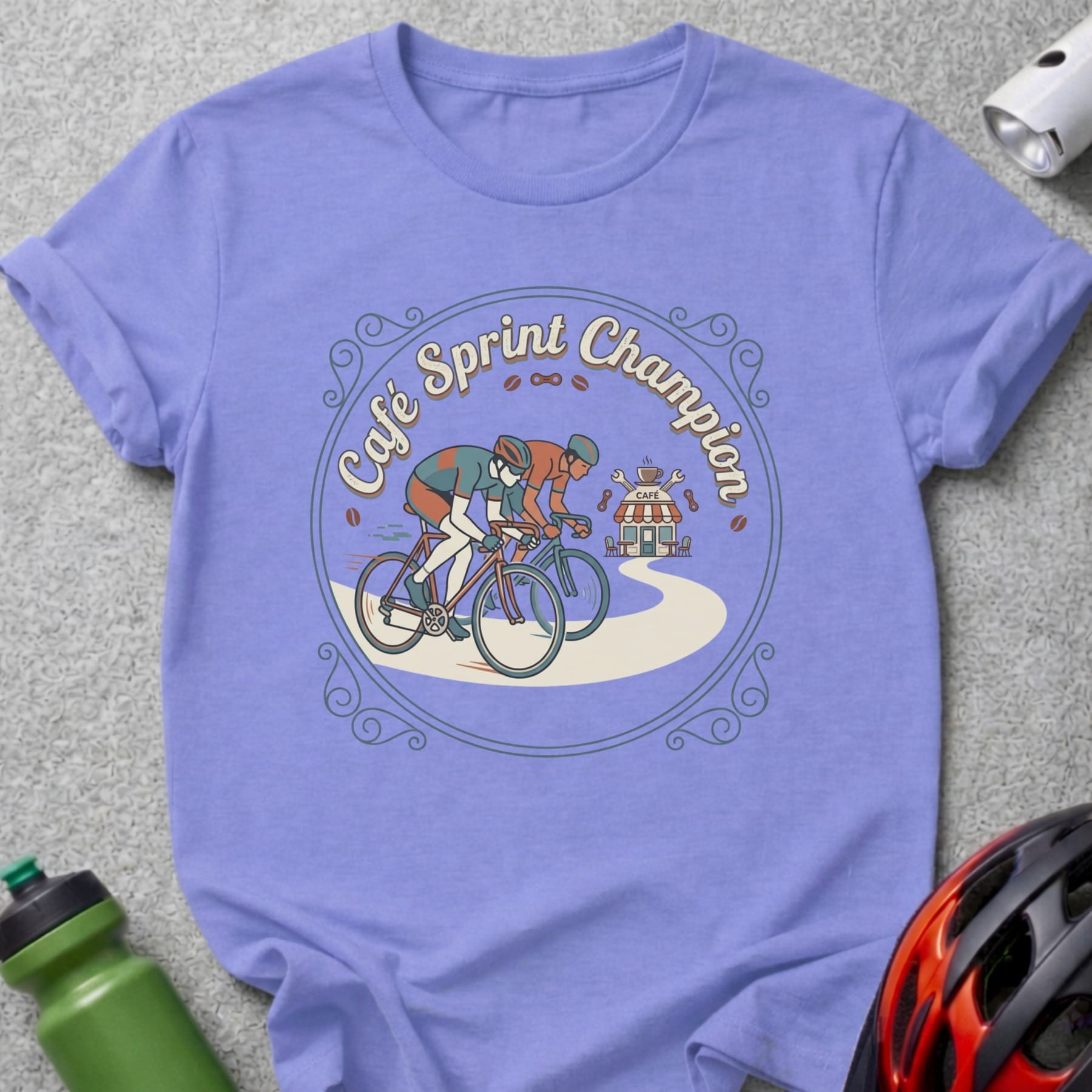 T-shirt with cyclists racing towards a cafe, text "Café Sprint Champion".
