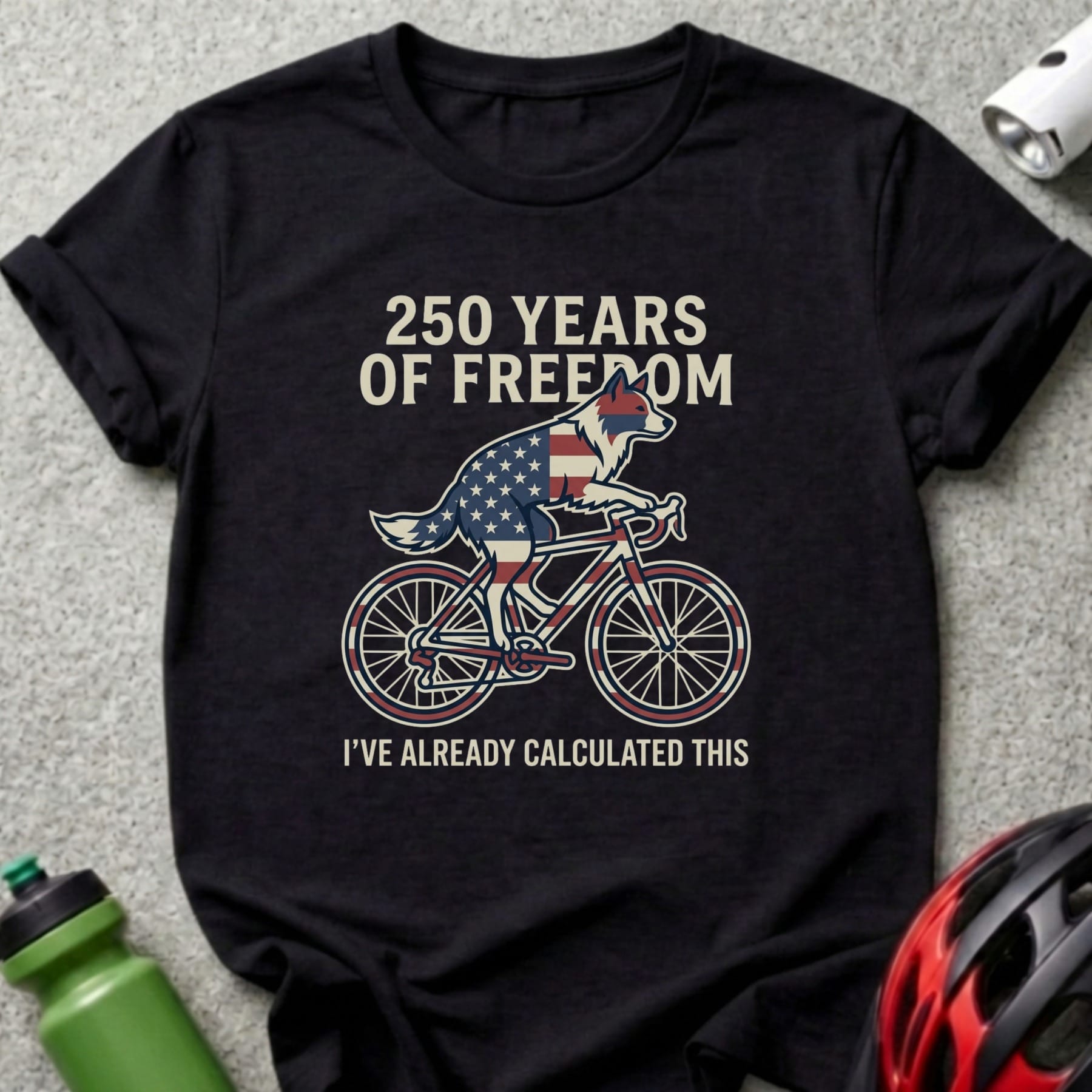 Black t-shirt with cyclist wearing American flag pattern, "250 Years Of Freedom" text.
