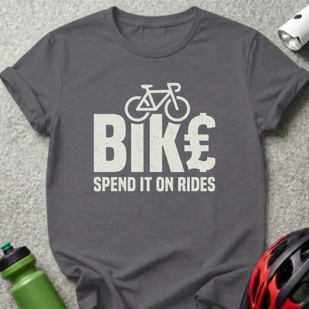 Dark gray t-shirt with "BIK€ SPEND IT ON RIDES" graphic.