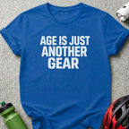 Blue t-shirt with "AGE IS JUST ANOTHER GEAR" in white text.