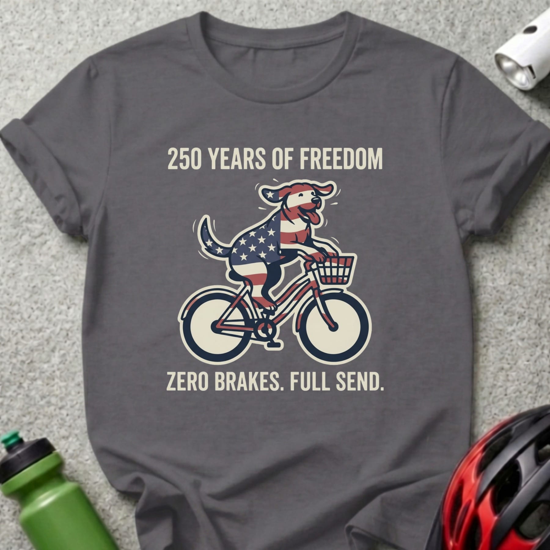 Dark grey t-shirt with "250 Years of Freedom Zero Brakes. Full Send." and a dog on a bike.