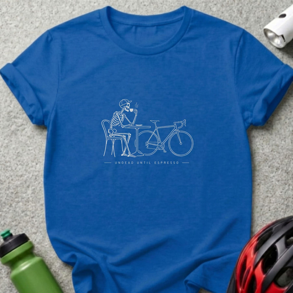 Skeleton sitting at a table with coffee and bicycle, text Undead Until Espresso.