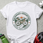 White t-shirt with "Backroad Adventure" circular logo and bicycle graphic.