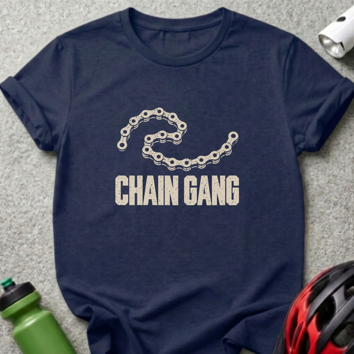 A navy blue t-shirt printed with the words "CHAIN GANG" and a bicycle chain graphic.
