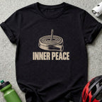 A black t-shirt features a graphic of a rolled-up bicycle inner tube with the text INNER PEACE underneath.