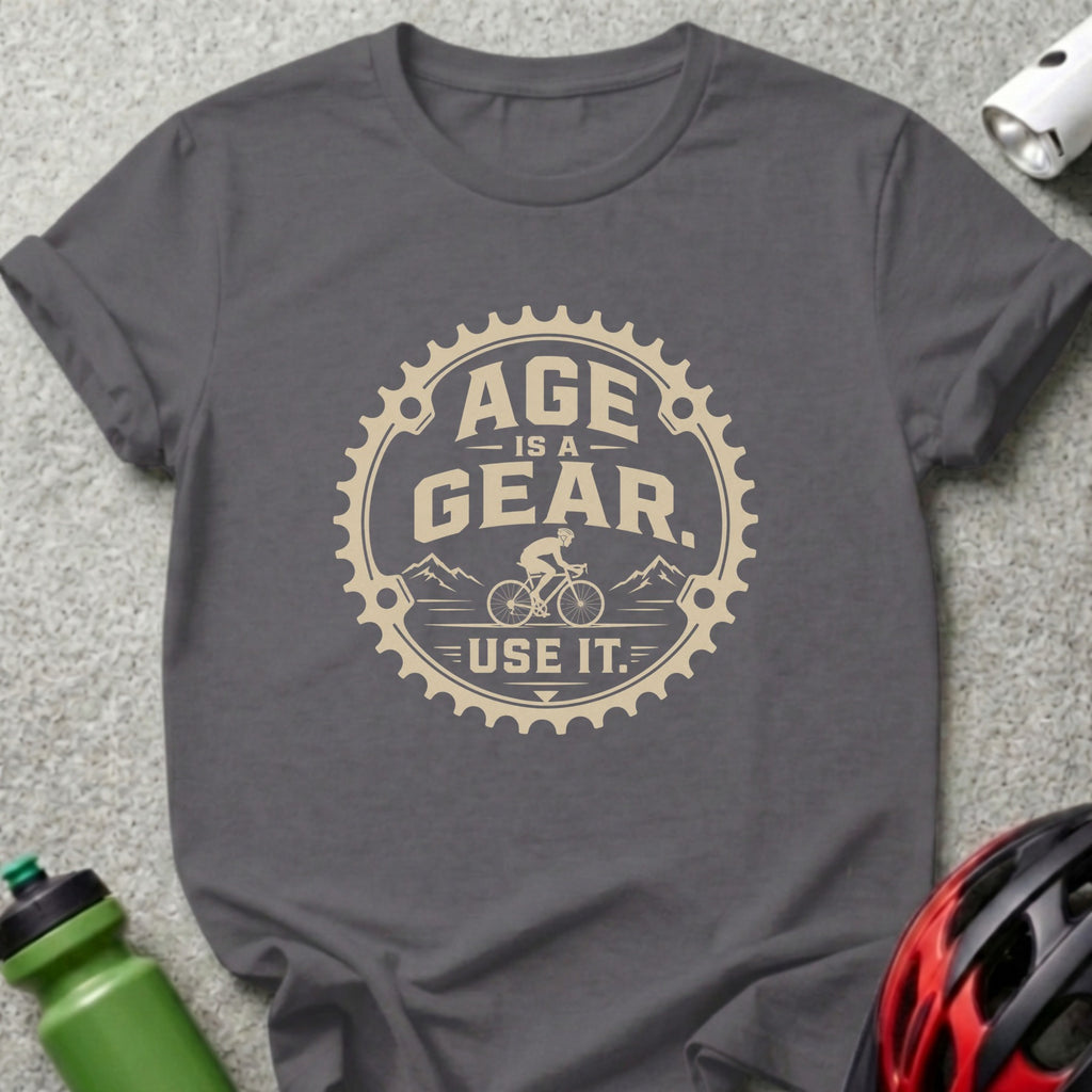 T-shirt with text "Age Is A Gear. Use It." and bicycle graphic.