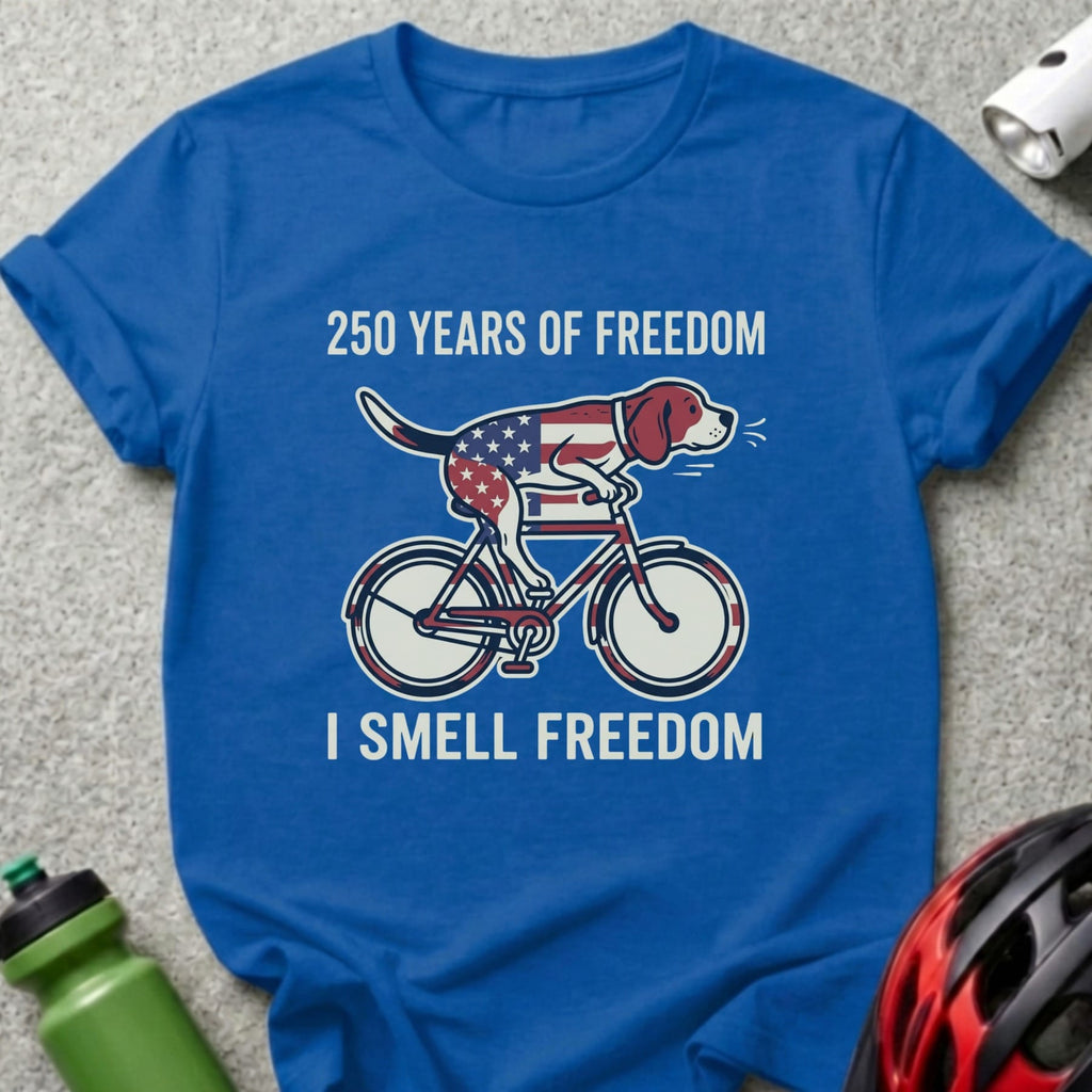 Blue t-shirt with dog on bicycle, "250 YEARS OF FREEDOM I SMELL FREEDOM" text.
