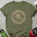 Green t-shirt with circular graphic of a cyclist and text "Grandpa's Bike Is Faster Than Yours".