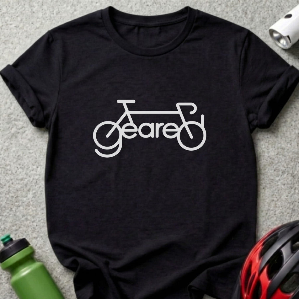 A black crewneck t-shirt featuring a white graphic combining a bicycle and the word geared.