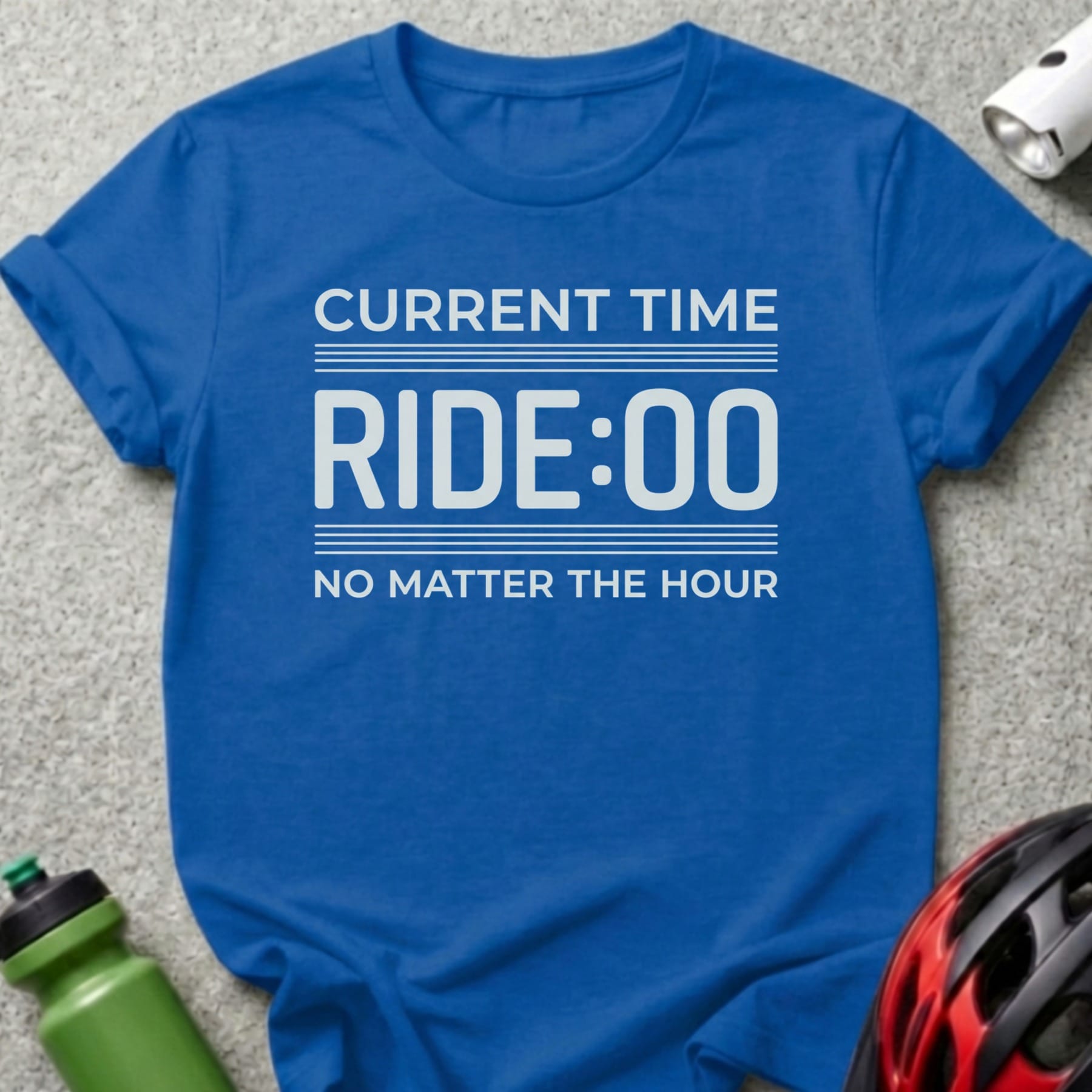 Blue t-shirt with "CURRENT TIME RIDE:00 NO MATTER THE HOUR" text.