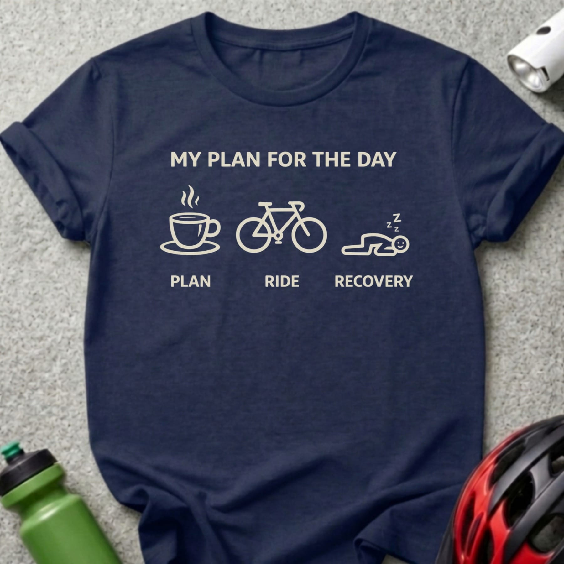 Navy t-shirt with "My Plan for the Day" text and icons for coffee, bike, and sleep.
