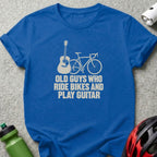 A blue t-shirt printed with a bicycle, guitar, and the text Old Guys Who Ride Bikes and Play Guitar.