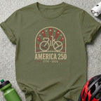 Olive green t-shirt with "AMERICA 250 1776 - 2026" and bicycle logo.