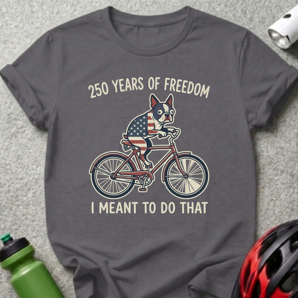 French bulldog in American flag bandana rides bicycle with "250 Years of Freedom" text.