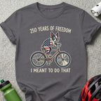 French bulldog in American flag bandana rides bicycle with "250 Years of Freedom" text.