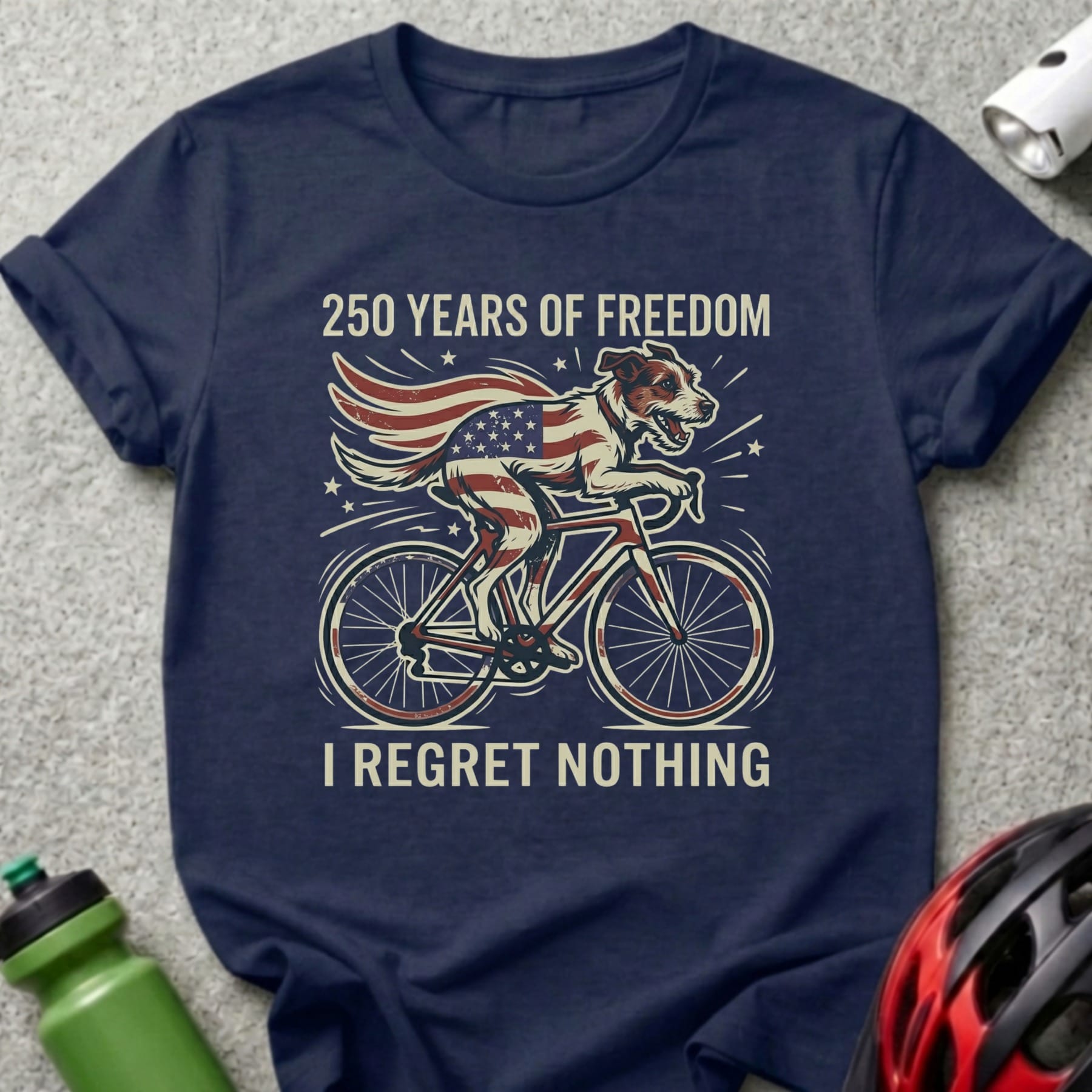 Dog in American flag cape rides bicycle, "250 Years of Freedom I Regret Nothing."