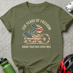 Green t-shirt with graphic of cyclist and dog, "250 Years of Freedom" and "Riding Together Every Mile".