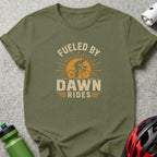 Olive green t-shirt with "Fueled By Dawn Rides" text and cyclist graphic.