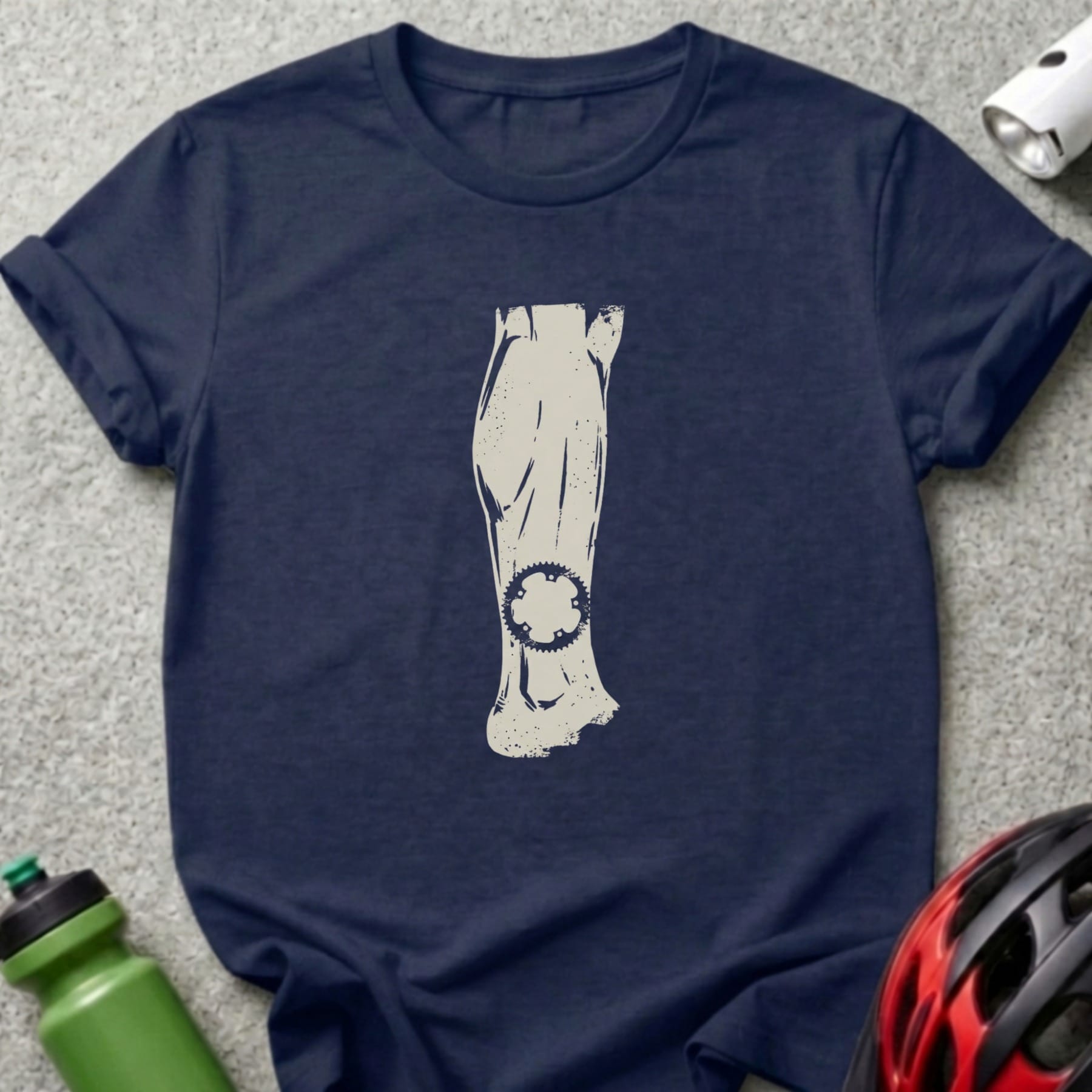 Dark blue t-shirt with a distressed graphic of a muscular leg with a gear.