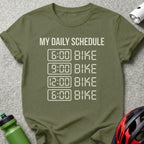 Olive t-shirt with "My Daily Schedule" and times for biking.