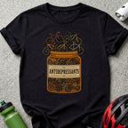 Black t-shirt with a jar of bicycles labeled "ANTIDEPRESSANTS".