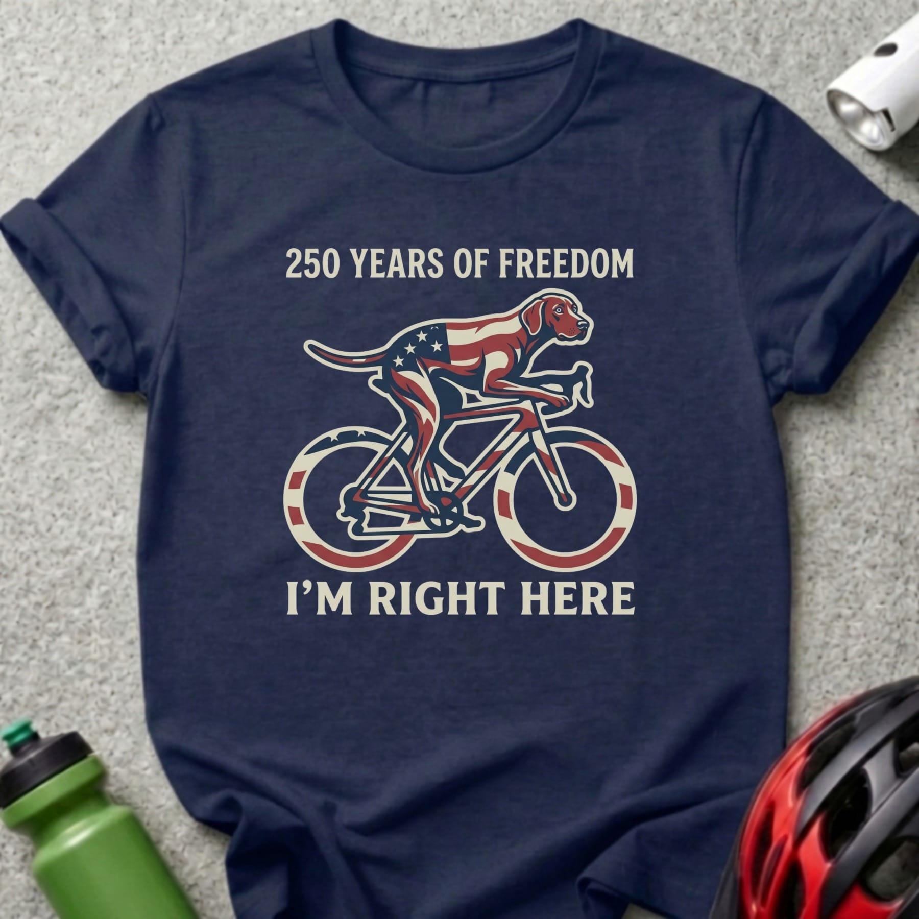 Navy t-shirt with American flag dog cycling graphic and text.