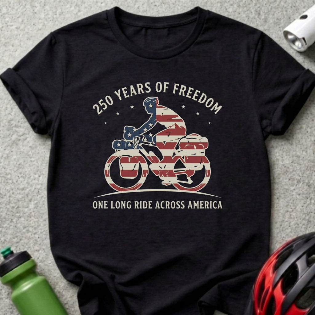 Black t-shirt with "250 Years of Freedom One Long Ride Across America" text and bicycle graphic.