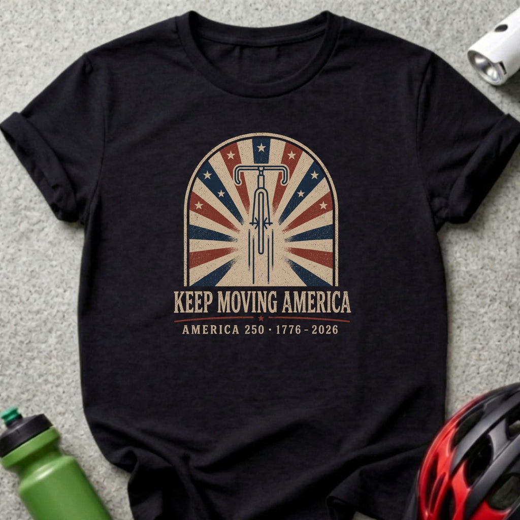 Black t-shirt with "Keep Moving America" and patriotic bicycle wheel design.