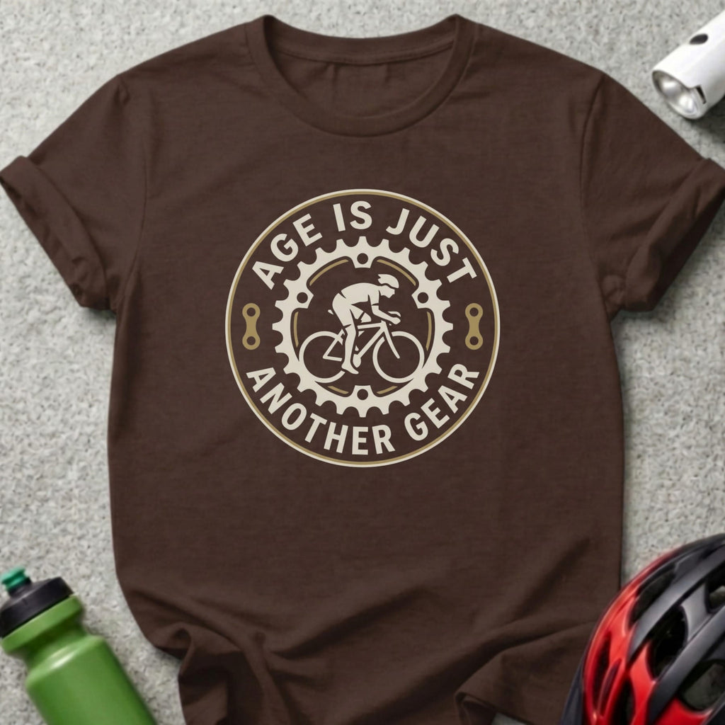 Brown t-shirt with "Age is just another gear" cycling graphic.