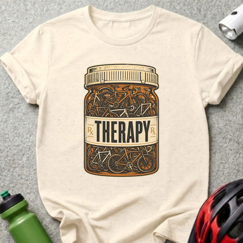 T-shirt with a pill bottle full of bicycles and the word "THERAPY" on it.