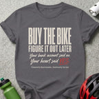 Dark grey t-shirt with "Buy the bike" and related text in white and red.