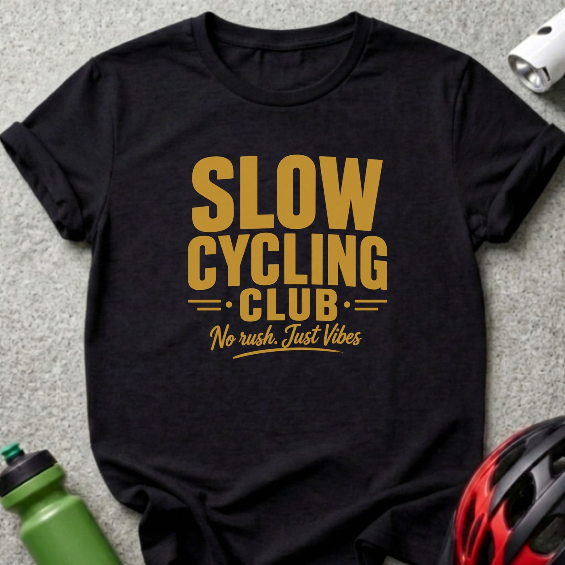 Black t-shirt with yellow text: Slow Cycling Club, No rush. Just Vibes.