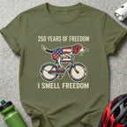 Beagle on a bicycle with US flag elements, reads "I smell freedom".
