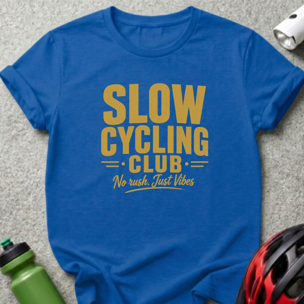 Blue t-shirt with "Slow Cycling Club No rush. Just Vibes" text.