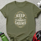 Olive t-shirt with "Keep the Cadence" bicycle graphic and crankset design.
